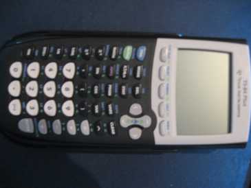 Photo: Sells Calculator TEXAS INSTRUMENTS - TI-89