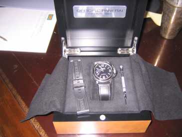 Photo: Sells Bracelet watch - mechanical Men - OFFICINE PANERAI - OFFICINE PANERAI - LUMINOR MARINA PAM 001 C