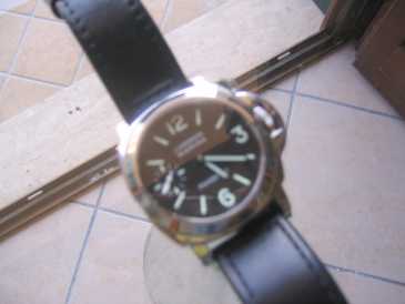 Photo: Sells Bracelet watch - mechanical Men - OFFICINE PANERAI - OFFICINE PANERAI - LUMINOR MARINA PAM 001 C