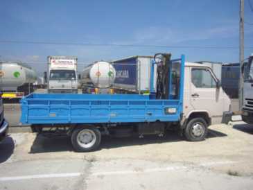 Photo: Sells Truck and utility NISSAN - NISSAN M80 GRUA