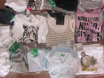 Photo: Sells Clothing Children - BENETTON - NUOVO