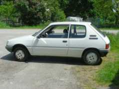 Photo: Sells Grand touring PEUGEOT - 205