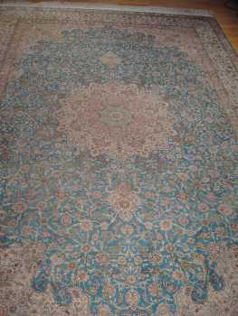 Photo: Sells Carpet HEREKE SEIDENTEPPICH ORIGINAL