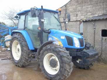 Photo: Sells Agricultural vehicle NEW HOLLAND TL 90 A - NEW HOLLAND TL 90 A