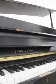 Photo: Sells Upright / vertical piano YOUNG CHANG - U107