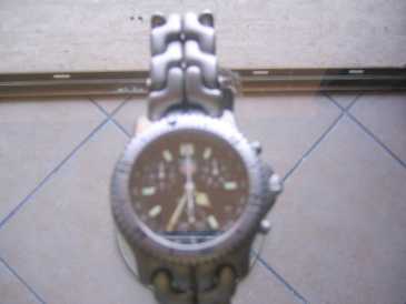 Photo: Sells Chronograph watch Men - TAG HEUER - KHZ