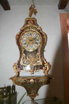 Photo: Sells Clock CARTEL