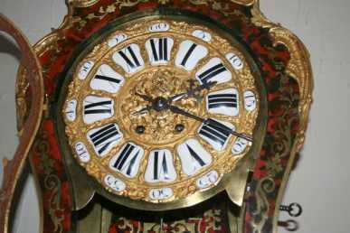 Photo: Sells Clock CARTEL