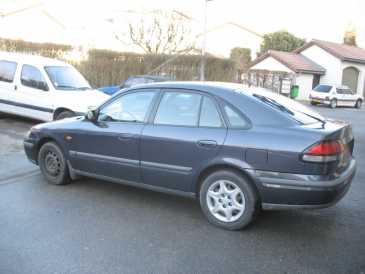 Photo: Sells Grand touring MAZDA - 626