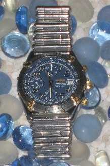 Photo: Sells Chronograph watch Men - CHRONOMAT - CHRONOMAT ACCIAIO ORO