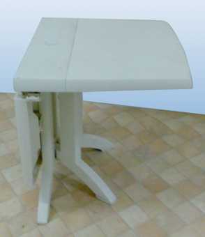Photo: Sells 5 Gardens tables