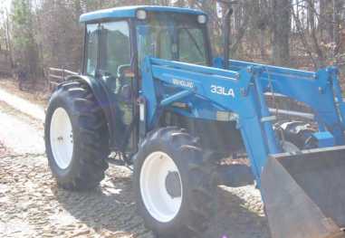 Photo: Sells Agricultural vehicle NEW HOLLAND - TN-65