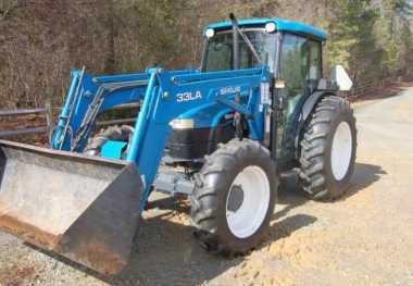 Photo: Sells Agricultural vehicle NEW HOLLAND - TN-65