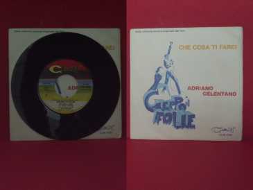 Photo: Sells Vinyl 45 rpm Pop, rock, folk - CHE COSA TI FAREI - ADRIANO CELENTANO