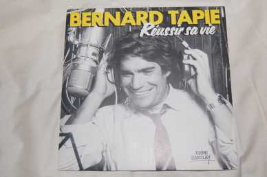 Photo: Sells Vinyl 45 rpm International music - REUSSIR SA VIE - BERNARD TAPIE